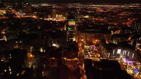 View-Of-Old-Quebec-Neighbourhood-in-Quebec-City,-Canada-During-Nighttime---aerial-drone-shot