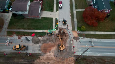 Tilting-to-Bird's-eye-over-a-construction-site-for-sewer-and-water