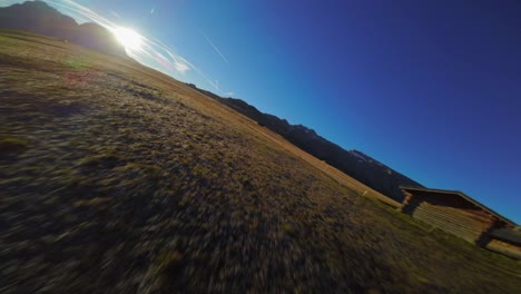 Mountains,-forest-and-grass-fields-filmed-at-Alpe-di-Siusi-in-Alps,-Italian-Dolomites-filmed-in-vibrant-colors-at-sunrise