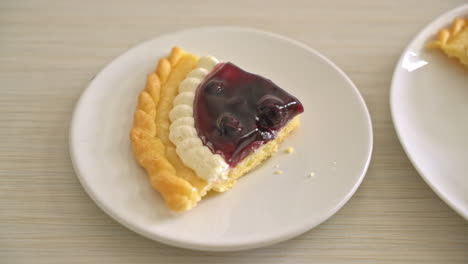 Delicious-Blueberry-Cheese-Pie-on-white-plate