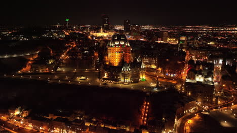 Aerial-View-Of-Old-Quebec-Skyline-At-Night-In-Canada---drone-shot
