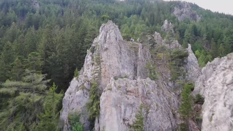 An-uphill-flight-with-a-FPV-drone-approaching-a-giant-rock