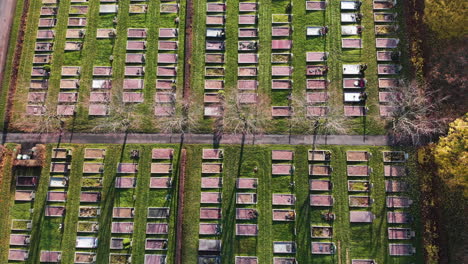 Vibrant-color-Kviberg-Cemetery-in-Gothenburg-city,-top-view,-aerial