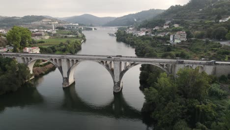 Ponte-De-Pedra-Bridge-over-Douro-river-at-Entre-os-Rios-town-in-Portugal