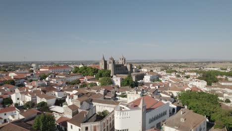 Evora-cathedral-monastery-in-Portugal,-aerial-view,-wide-orbital-shot-cityscape-in-Europe