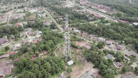 Aerial-circling-shot-of-telecommunication-tower-in-Pasir-Besar,-Malaysia