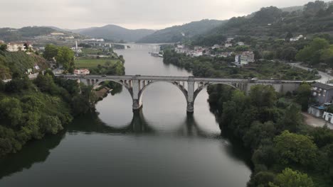 Ponte-Duarte-Pacheco-bridge,-Tâmega-and-Douro-River,-Entre-os-rios,-Portugal