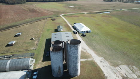 Aerial-orbiting-around-old-silos-on-farmland-Burgaw,-North-Carolina