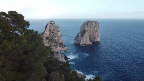 Faraglioni-cliffs-in-Capri-island,-aerial-drone-view