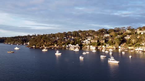 Aerial-Drone-shot-4k-30fps-Lili-Pili-NSW,-boats-and-urban-shore