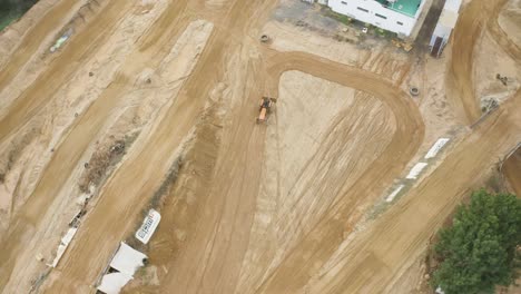 aerial-top-view-of-trator-preparing-the-jumps