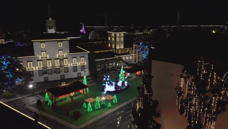 Cute-Christmas-decoration-lights-on-idyllic-square-in-Funchal,-Praca-do-Município