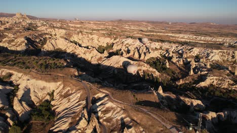 Drone-Aerial-View-of-Picturesque-Landscape-of-Cappadocia,-Turkey-on-Sunny-Summer-Morning