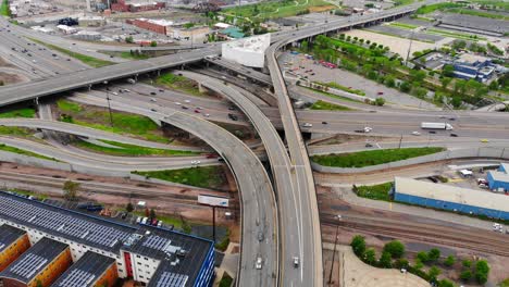 Traffic-Driving-On-Interstate-Highway-Road-Convergence-Near-Downtown-Denver,-Colorado