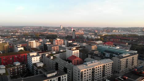 Aerial-ascending-view-Hisingen-cityscape-horizon,-tranquil-urban-scene,-Hisingen,-Gothenburg