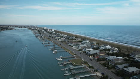 Beautiful-scenic-aerial-looking-over-Wrightsville-Beach,-North-Carolina