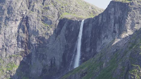 Majestic-Cascading-Waterfall-of-Mardalsfossen-On-A-Sunny-Day---wide-shot