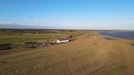 Aerial-drone-view-shingle-street-Suffolk-England-bright-sunny-day