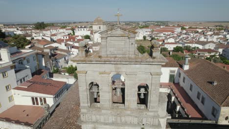 Panoramic-aerial-view-with-close-up-of-the-cathedral-bells