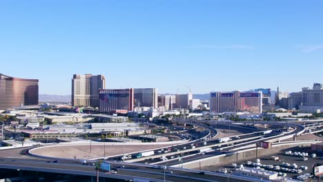 Aerial-shot-of-the-Casino-Strip-in-Las-Vegas-on-a-sunny-summer-day,-USA