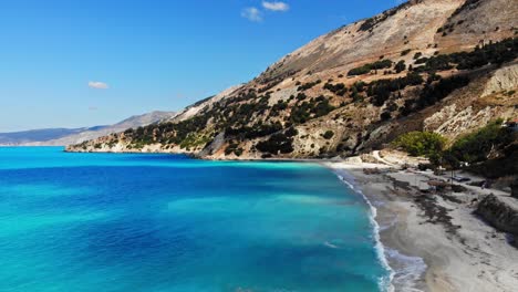 Sandy-Beach-of-Agia-Kiriaki-with-Emerald-Clear-Sea-in-South-Milos-Island,-Cyclades,-Greece---aerial-drone-shot