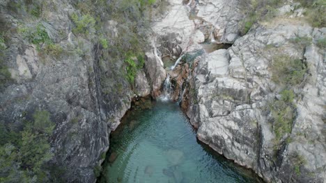 Aerial-ascending-view-over-waterfall-Portela-Do-Homem