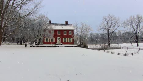 Red-brick-home-covered-in-winter-snow
