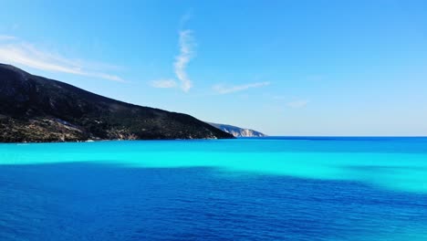 Amazing-Blue-Ocean-And-Mountains-At-Agia-Kiriaki,-Kefalonia,-Greece---aerial-drone-shot