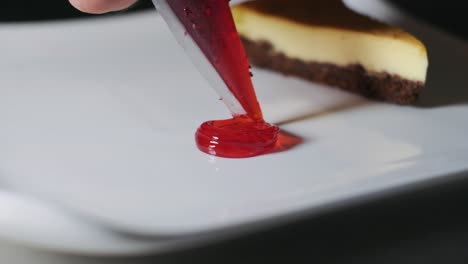 Piece-of-tasty-chocolate-cheese-cake-served-in-white-plate-on-table
