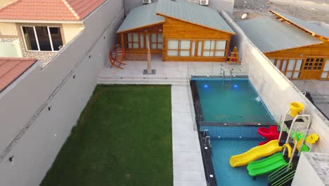 Landscape-of-newly-built-house-with-pool-and-garden