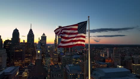 American-flag-waves-in-urban-city-USA