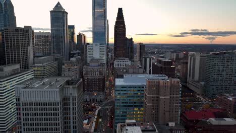 Aerial-tilt-down-of-urban-center-city,-Philadelphia-USA
