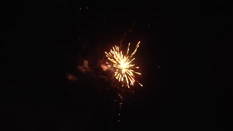 Colored-fireworks-blast-off-and-explode-in-night-sky