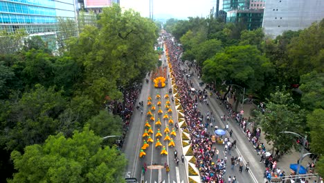 overhead-drone-shot-of-the-day-of-the-dead-parade-in-mexico-city-with-people-in-costumes