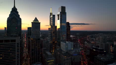 Silhouettes-of-office-building-towers-at-sunset