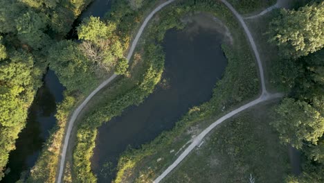 Circling-Aerial-View-of-a-Park-Pond