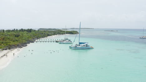 Tourist-Boat-on-Tropical-Island-Beach-of-Cayo-Icacos,-Puerto-Rico---Aerial