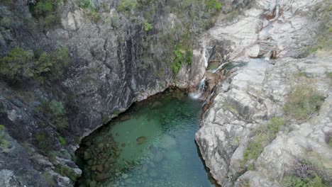 Aerial-tilt-down-over-waterfall-Portela-Do-Homem