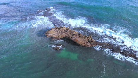 Rock-in-the-Ocean-Puerto-Rico,-above-shot