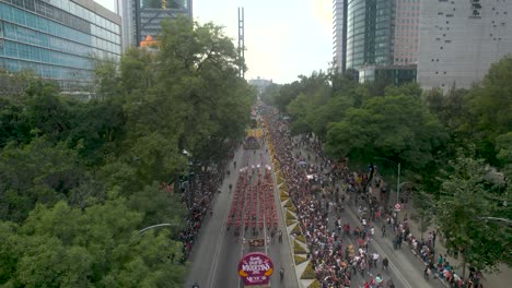 Aerial-drone-shot-of-the-inauguration-Day-of-the-Dead-parade-in-Mexico-City