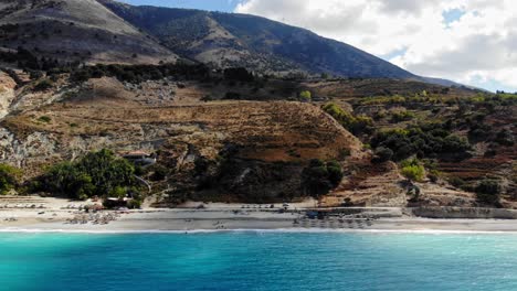 The-rocky-landscape-of-Agia-Kiriaki-Beach-in-Milos,-Greece---aerial-drone-dolly-shot