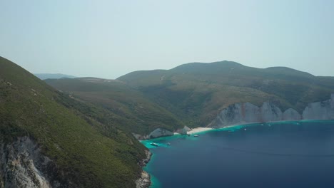 Aerial-side-motion-natural-Fteri-Beach-on-the-northern-coast-of-Kefalonia-Island