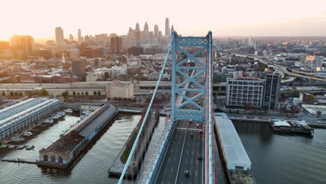 Aerial-turn-reveals-Philadelphia-skyline-from-Ben-Franklin-Bridge