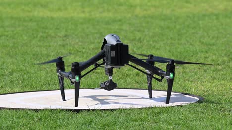 A-big-drone-takeoff-on-a-bright-sunny-day,-Drone-flying,-Drone-camera,-quadcopters