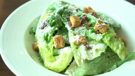 Caesar-salad-on-white-plate