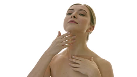 Portrait-of-a-young-woman-gently-massaging-her-neck