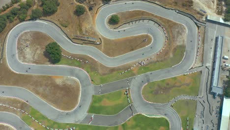 Overhead-aerial-of-a-go-kart-race-track,-cenital-shot-of-racing-karting-hobby,-above-view-of-a-motorsport-circuit