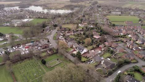 Aerial-view-above-UK-British-small-residential-countryside-farming-village
