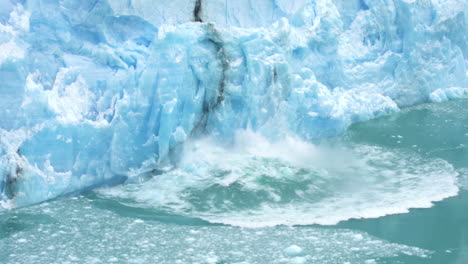 Glacier-Ice-Collapse-Into-Ocean-Water,-Close-Up