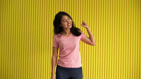 Asian-Women-dancing-with-yellow-background